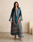 Woman wearing blue printed raw silk suit with striped trouser and teal dupatta