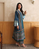 Side view of blue printed raw silk suit with embroidered sleeve and striped trouser