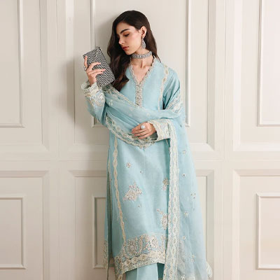 Women wearing a Luxury Pret Dress