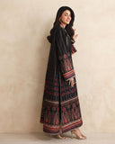 Side view of black printed raw silk suit showing striped dupatta and embroidered sleeve