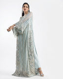 Side profile of an Aqua Net suit with an embellished organza dupatta draped over the shoulder