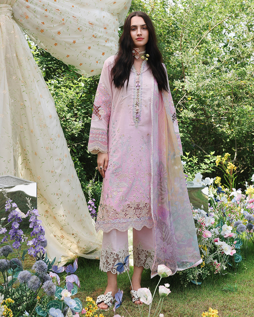 Woman wearing a light pink unstitched lawn suit with embroidered detailing, Secret Garden collection