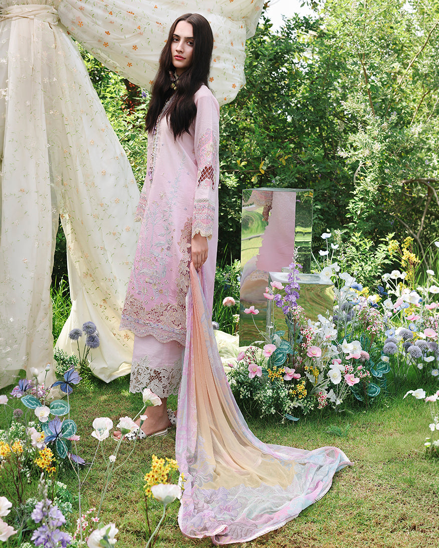 Side view of embroidered lawn unstitched suit in light pink with lace hem, Secret Garden collection