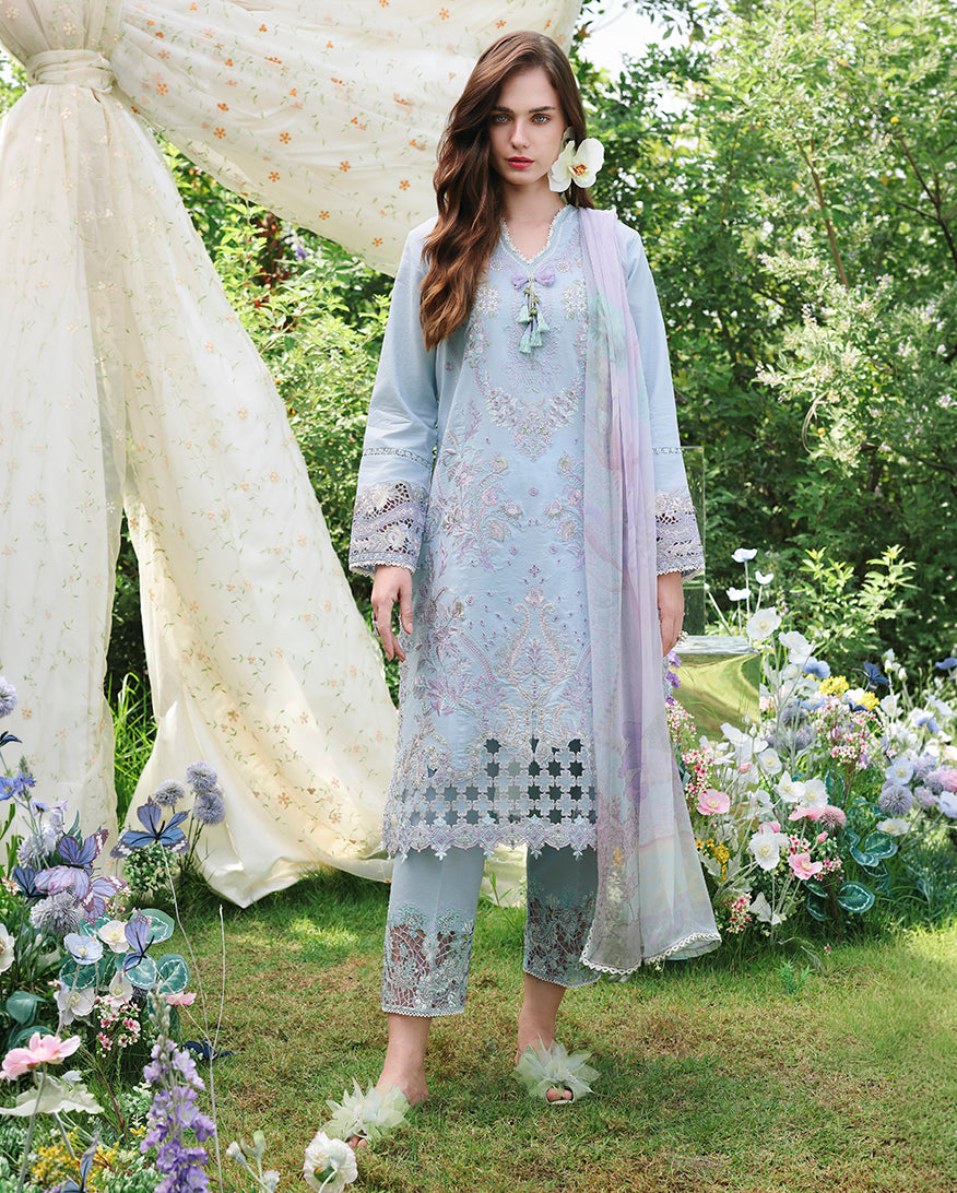 Woman wearing a sky blue unstitched lawn suit with embroidered detailing, Secret Garden collection