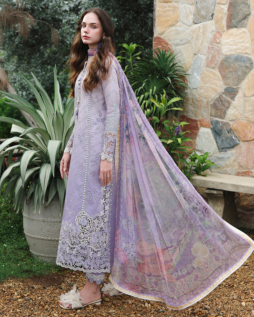 Side view of lavender embroidered lawn suit with printed dupatta drape and lace hem, Secret Garden collection