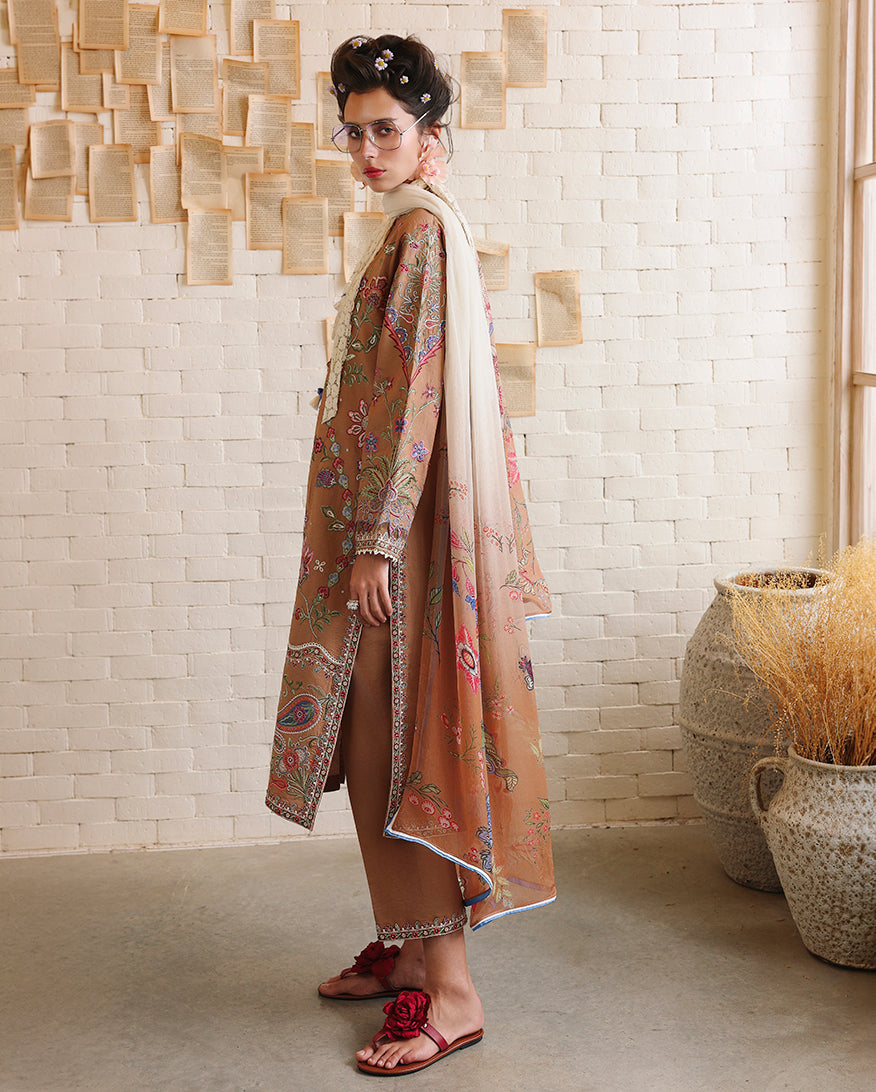 Woman wearing a coffee brown unstitched lawn suit with multicolor embroidery, Secret Garden collection