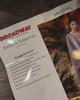 Mushq Broadway Winter Vol. I showing the Eastern Empress winter unstitched ivory jacquard fabric pieces: floral pattern, white floral embroidery, trouser fabric with embroidered vertical stripes and plain shawl fabric